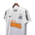 Camisa retrô branca do Santos FC com logotipo da Nike e patrocinadores BMG e Netshoes