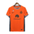 Camisa laranja do Inter de Milão 23/24, modelo torcedor da Nike, com detalhes em cinza e logo da equipe.