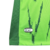 Camiseta verde claro do Sporting 24/25, modelo torcedor masculino da Nike, com detalhes em preto e logo da Betano.