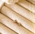 Brinco Delta dourado - comprar online