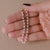Pulseira minimalista pérolas na internet