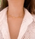 CHOKER DE CHAPINHA DE CORAÇÃO DOURADO