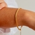 Pulseira malha, banhada em ouro na internet
