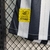 Imagem do Camisa Santos II 23/24 - Feminina Umbro - Branca com listra preta.