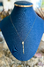Colar em Ouro Amarelo 18k com Detalhe Oval e Fios Pendentes - comprar online