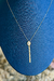 Colar em Ouro Amarelo 18k com Detalhe Oval e Fios Pendentes - Bateia Joias
