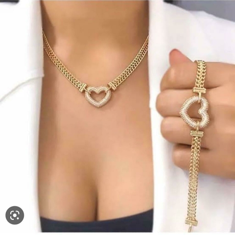 Lindo Conjunto e Pulseira cravejado com Zircônias banhado a ouro 18k.