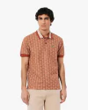 Chomba Monogram Lacoste.
