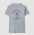 Camiseta cinza unissex com estampa azul de cachorro sorridente e texto divertido "Sou perfeita? Não. Estou melhorando? Também não".