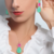 CONJUNTO LUXO COM PEDRAS ESMERALDA COLOMBIANA E FUCSIA PINK