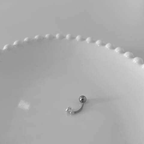 Piercing de Umbigo Ponto de Luz