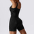 Macacão fitness: design justo, texturizado, com alças finas e decote sutil, perfeito para realçar a silhueta com conforto e estilo. - In Brasil Express