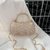 Pequena Bolsa de ombro PVC feminina: elegante e versátil. na internet