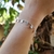 Conjunto de colar e pulseira de medalha - comprar online