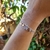 Pulseira 4 corações e 1 borboleta - comprar online