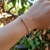 Pulseira Feminina Prata Palito e Corações Cheio - Nébula Jóias