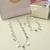 Conjunto de colar e pulseira de medalha