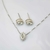 Conjunto de colar e brincos cravejados com zircônia central - loja online