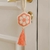 Borla flor africaca hexagonal beige y naranja - comprar online
