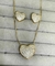 Conjunto coração cravejado em zirconia cristal banhada a ouro 18k na internet