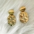 Brinco texturado oval banhado a ouro 18k