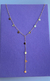 Colar em T medalhinhas dourado