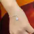 Pulseira Ping Ponto De Luz Coração na internet