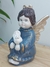 Anjo Pomba Sentado