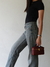 WINE RED VANITY CASE BAG en internet