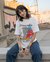 Camiseta Send More Tourists 2000’ na internet