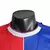 Camisa Crystal Palace I 23/24 - Jogador Macron Masculina - Vermelha/Azul na internet