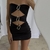 VESTIDOS & CATSUITS