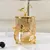 Pote em vidro com tampa Butterflay, detalhes em dourado