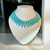 colar dente turquesa