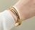 Bracelete liso preto na internet