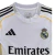 Camisa Real de Madrid I 25/26 - Torcedor Adidas Masculina - Branca com detalhes em cinza e amarelo - Tsnsport