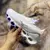 Mizuno Wave Prophecy WK Branco/Roxo na internet