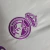 Image of Camisa Real Madrid Goleiro 23/24 - Torcedor Adidas Masculina - Branca com detalhes em roxo