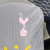 Camisa Tottenham Treino 23/24 - Jogador Nike Masculina - Cinza com detalhes em rosa e amarelo - loja online