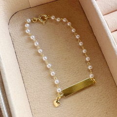 Pulseira Infantil Com Pérolas Plaquinha Personalizável Banhada A Ouro na internet