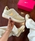 Tênis Nike Air Force Gold Metalizado na internet