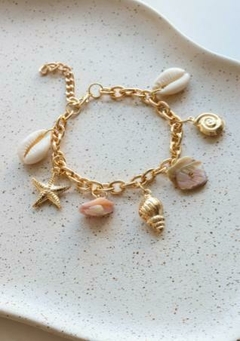 PULSEIRA COM OS ELEMENTOS DO MAR