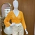 BLUSA TRICOT TELADO ENVELOPE na internet