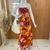 Vestido midi vento de fruta na internet