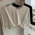 Blusa cropped detalhe na cintura