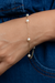 Pulseira com 5 Pérolas Banhada a Ouro 18k – Delicadeza e Sofisticação | Maresea Semijóias - comprar online