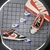 Dunk Low Preto e Laranja