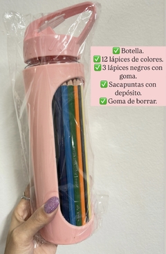 Botella con lápices , sacapuntas con depósito y goma de borrar