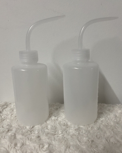 Botella limpiador de extensiones de pestañas