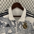Jaqueta Corta Vento Dupla Face Real Madrid - Dragon 2023/24 na internet
